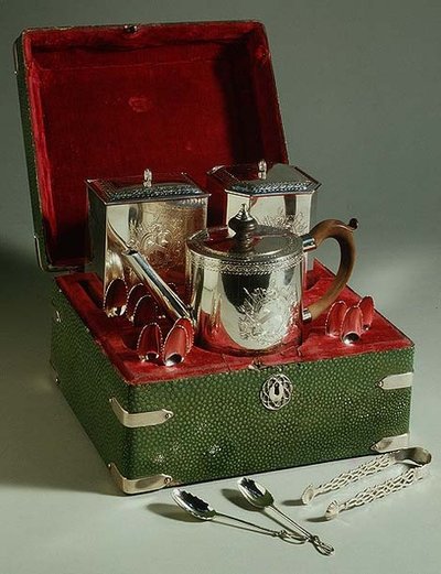 George III tea set in leather case by English School